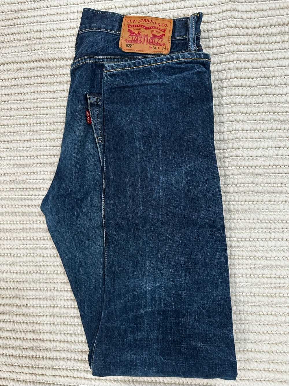 Vintage Levi's Slim Straight Jeans in Dark Blue with Tan Patch
